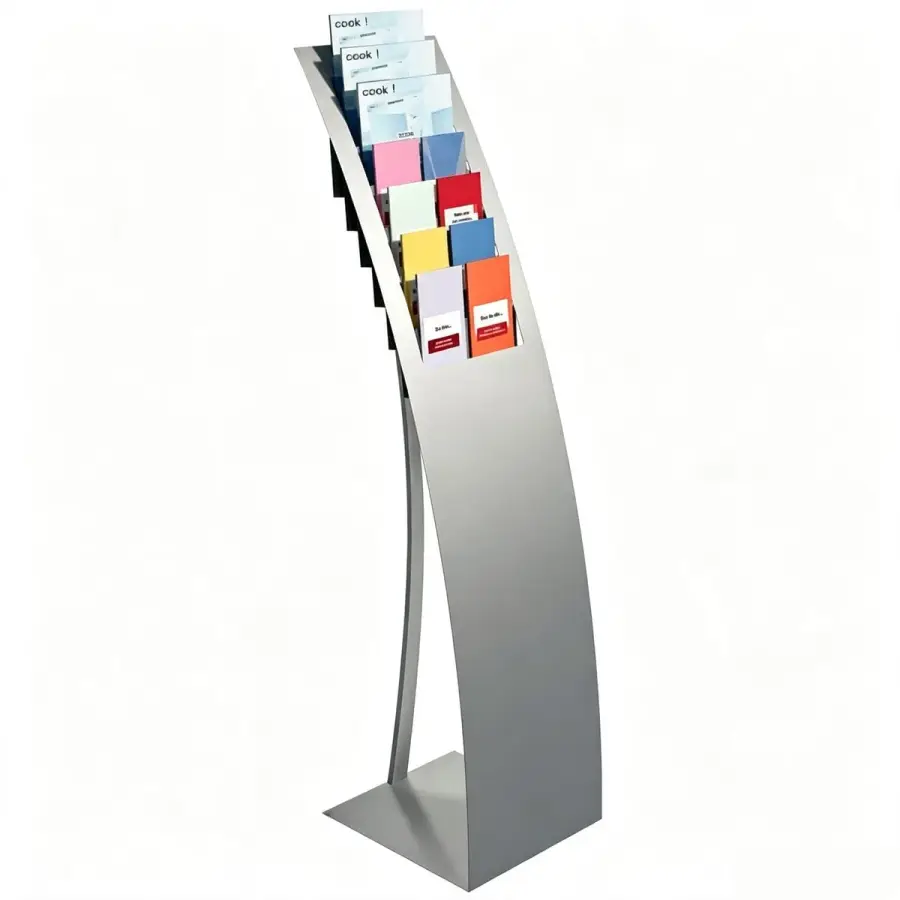 Floor-standing brushed metal brochure dispenser with arched front panel and 6-8 tiered pockets holding colorful brochures